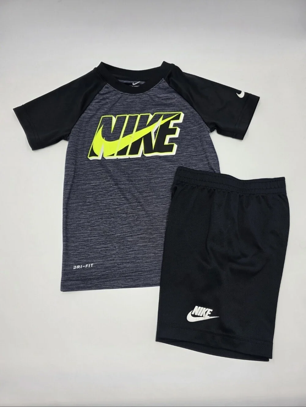 Nike boys' Dri-Fit tee and black athletic shorts size 6